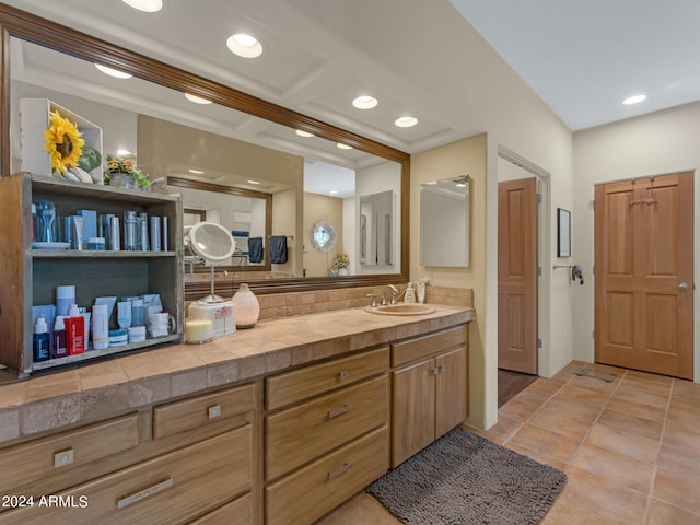 bathroom with vanity and tile patterned floors