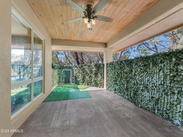 exterior space with ceiling fan