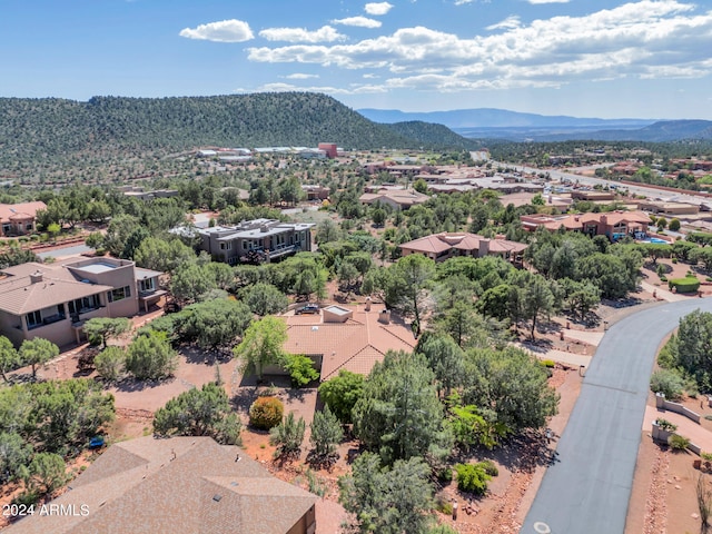 birds eye view of property with a mountain view