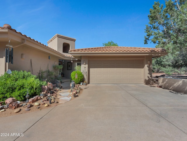 view of front of property with a garage