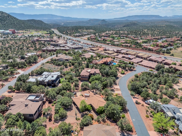 drone / aerial view featuring a mountain view