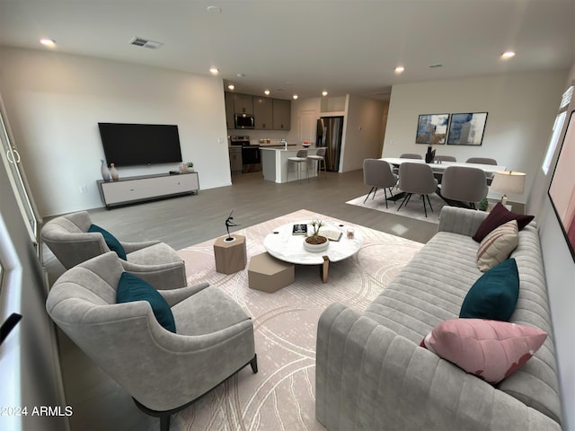 living room featuring light wood-type flooring