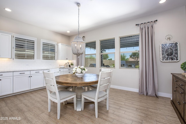 3118 E Gary Way, Phoenix, AZ 85042 - dining area with recessed lighting, a chandelier, baseboards, and light wood-type flooring