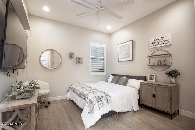 3118 E Gary Way, Phoenix, AZ 85042 - bedroom with baseboards, wood finished floors, recessed lighting, and a ceiling fan