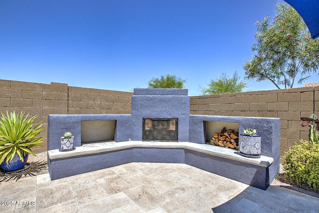 3118 E Gary Way, Phoenix, AZ 85042 - view of patio with exterior fireplace