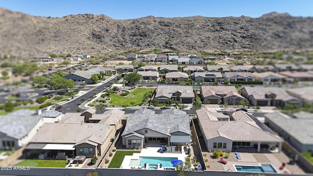 3118 E Gary Way, Phoenix, AZ 85042 - aerial perspective of suburban area featuring a mountain backdrop and a pool