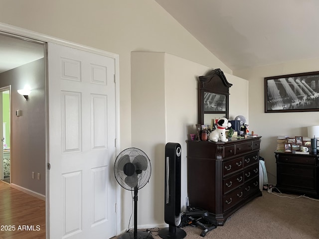 bedroom featuring lofted ceiling