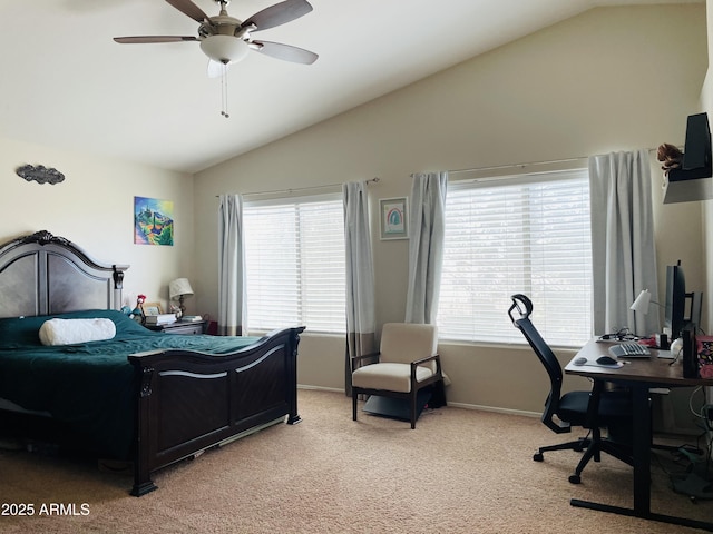 bedroom with vaulted ceiling, ceiling fan, baseboards, and light colored carpet