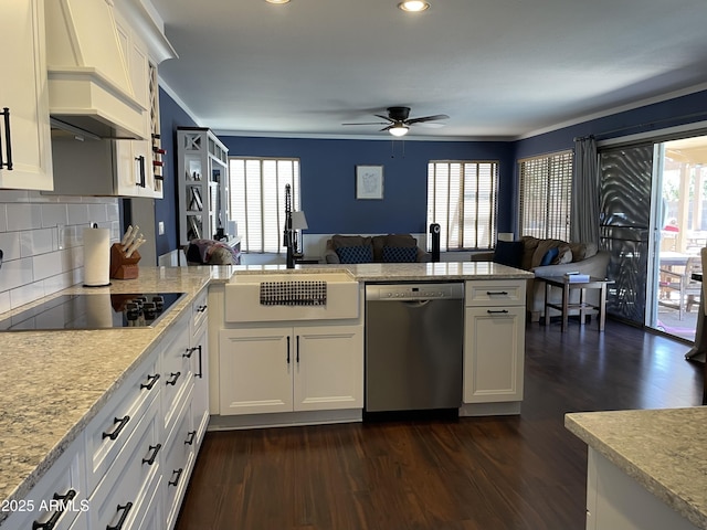 kitchen featuring black electric stovetop, premium range hood, a sink, open floor plan, and dishwasher