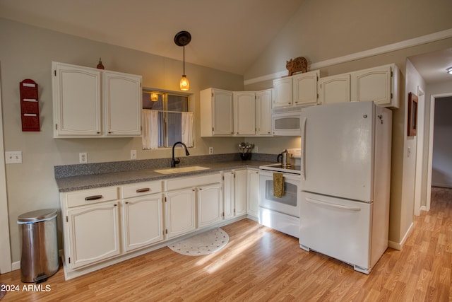 kitchen featuring white cabinets, white appliances, light hardwood / wood-style floors, and sink