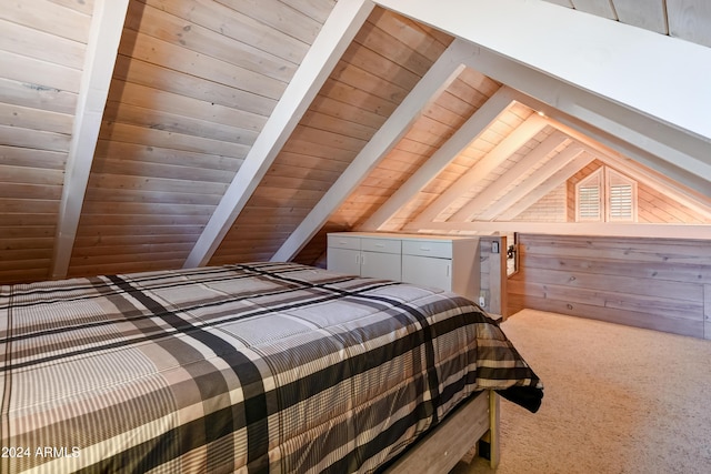 carpeted bedroom with wooden walls, lofted ceiling with beams, and wooden ceiling