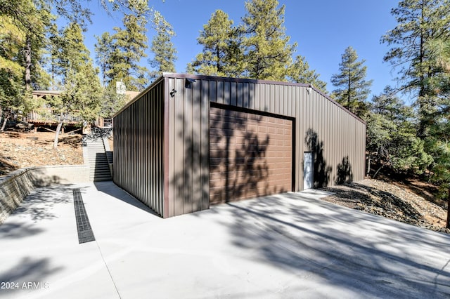 view of outbuilding with a garage