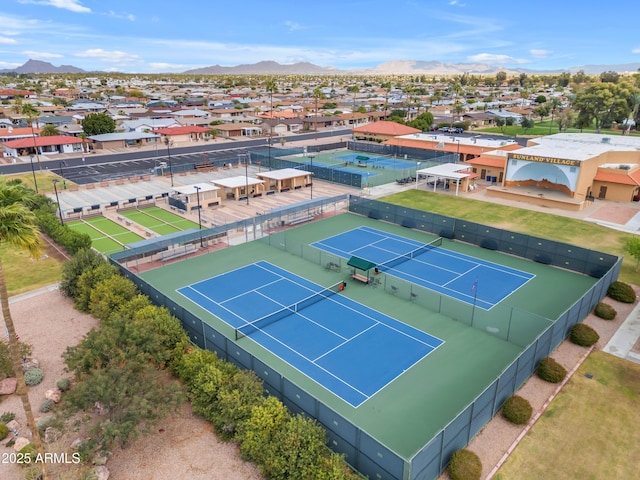 drone / aerial view with a mountain view and a residential view