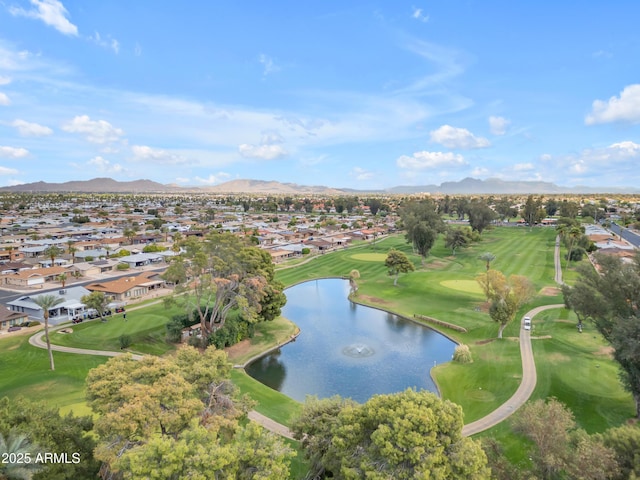 birds eye view of property with a residential view, a water and mountain view, and golf course view