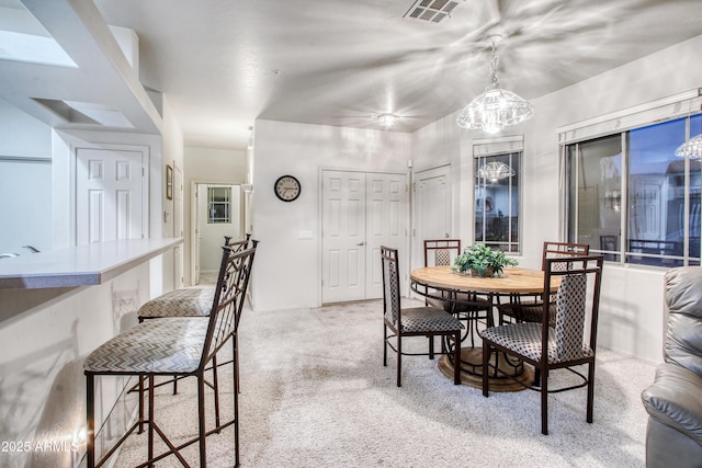 view of carpeted dining room