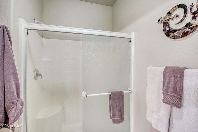 bathroom with an enclosed shower