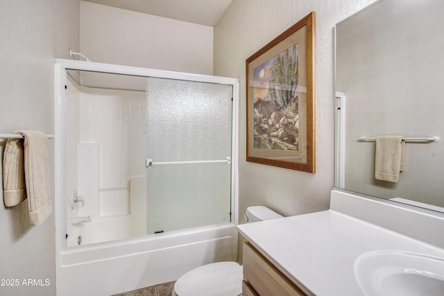 full bathroom featuring toilet, vanity, and  shower combination