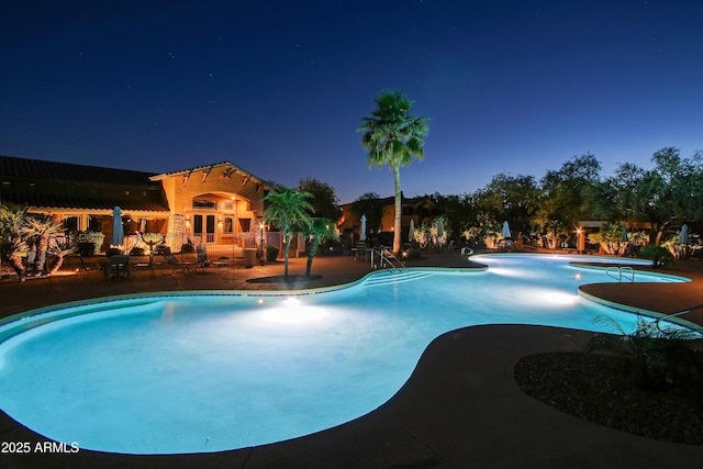 view of pool featuring a patio area