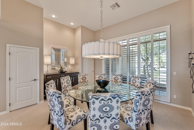 view of carpeted dining space