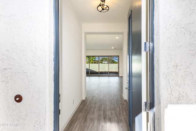 hallway featuring hardwood / wood-style floors