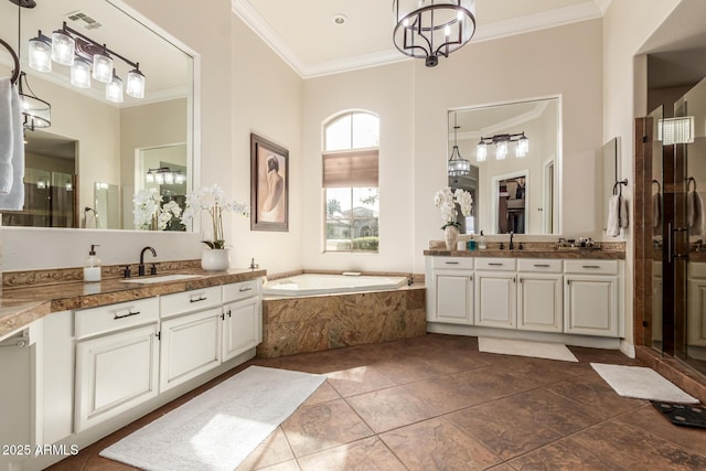 bathroom with crown molding, vanity, and shower with separate bathtub