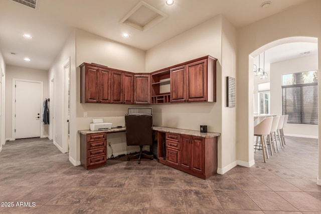 office area featuring built in desk