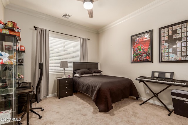 bedroom with crown molding, light colored carpet, and ceiling fan