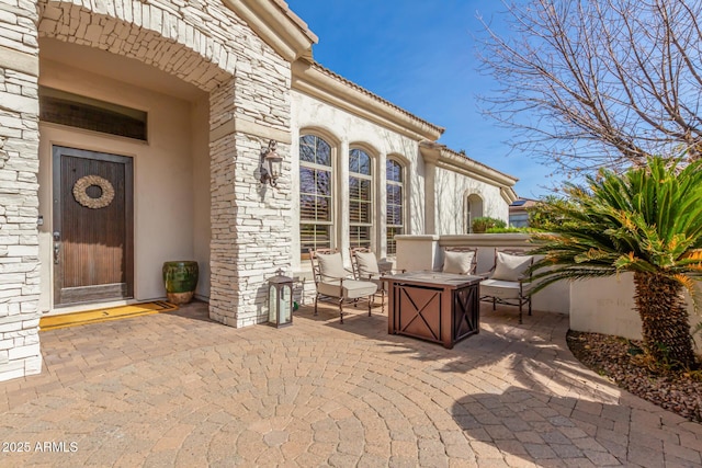 view of patio with a fire pit