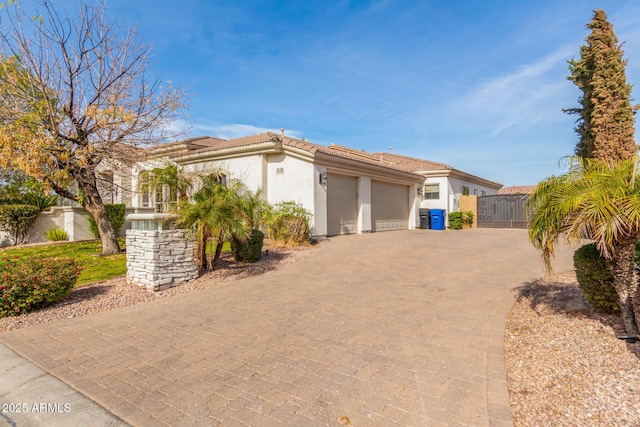 view of front of property featuring a garage