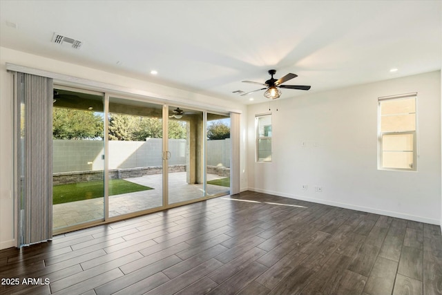 spare room with ceiling fan