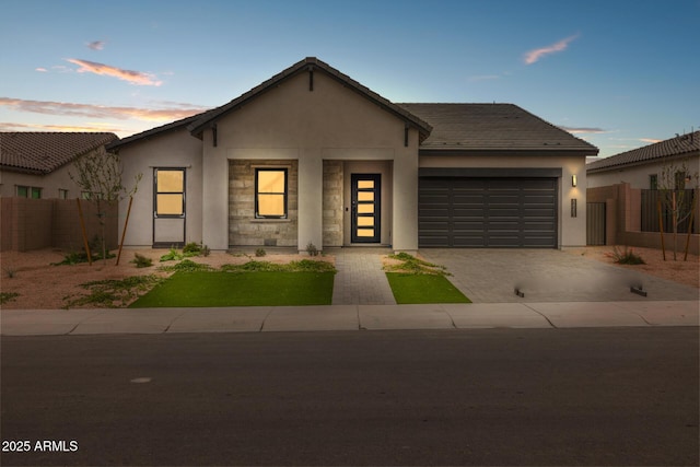 view of front of property featuring a garage