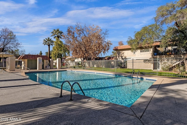 view of swimming pool featuring a patio