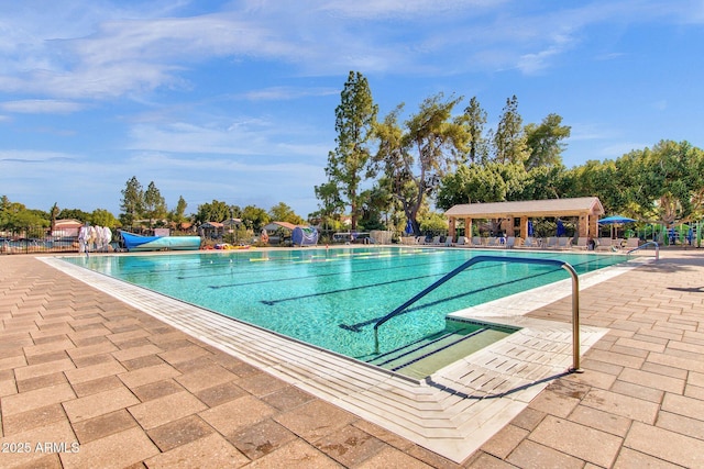 view of swimming pool featuring a patio