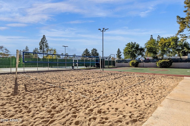 view of community featuring basketball court