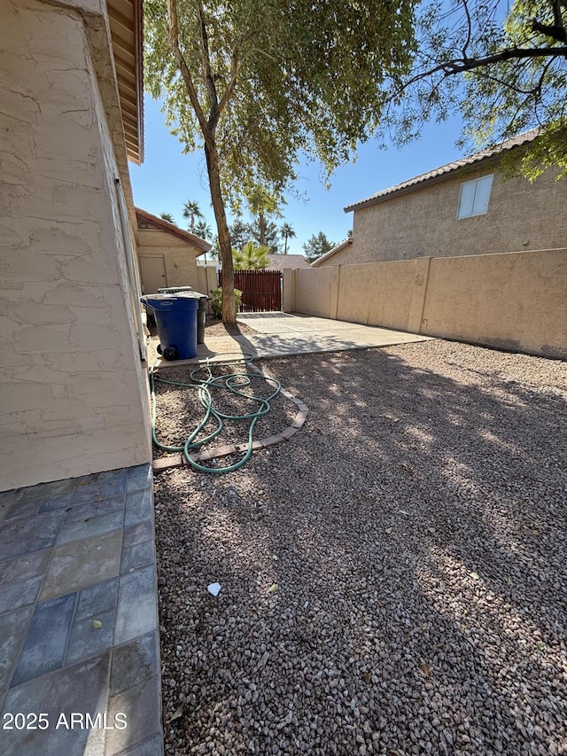 view of yard with a patio area