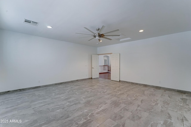 empty room with recessed lighting, baseboards, visible vents, and ceiling fan