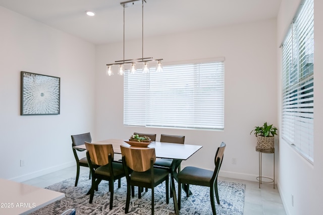 2513 E Pleasant Ln, Phoenix, AZ 85042 - tiled dining space with baseboards and recessed lighting