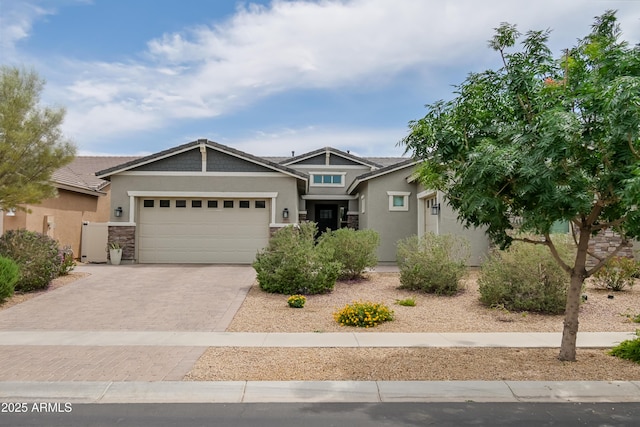 2513 E Pleasant Ln, Phoenix, AZ 85042 - craftsman-style home with decorative driveway, stucco siding, and a garage