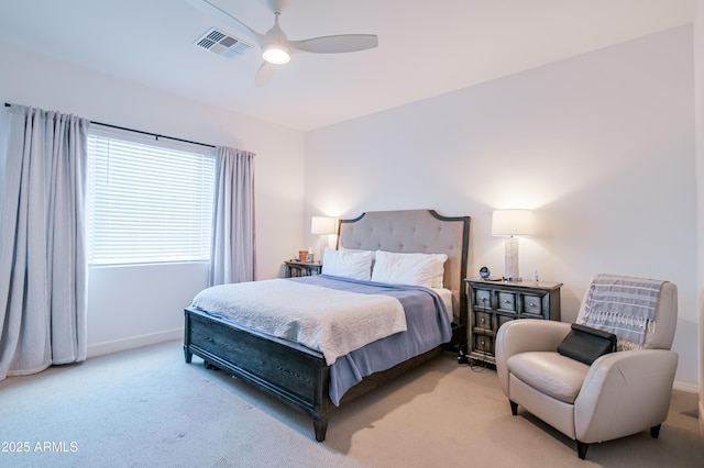 2513 E Pleasant Ln, Phoenix, AZ 85042 - bedroom featuring light colored carpet, baseboards, and a ceiling fan