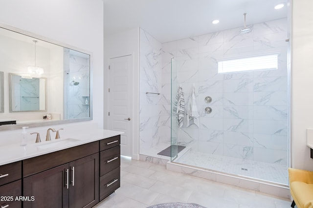 2513 E Pleasant Ln, Phoenix, AZ 85042 - bathroom featuring a marble finish shower, vanity, recessed lighting, and tile patterned floors