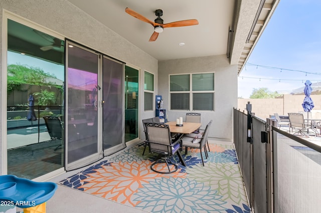 2513 E Pleasant Ln, Phoenix, AZ 85042 - balcony with ceiling fan and outdoor dining area