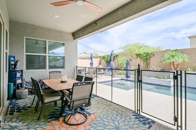 2513 E Pleasant Ln, Phoenix, AZ 85042 - balcony with outdoor dining space, view of pool, a ceiling fan, a patio area, and a hot tub