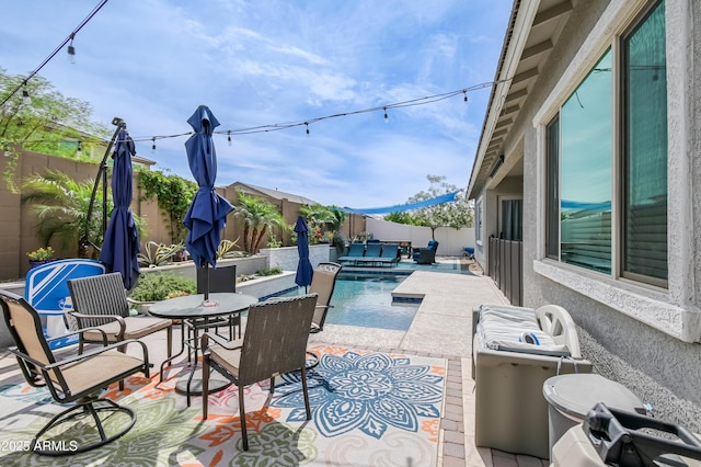 2513 E Pleasant Ln, Phoenix, AZ 85042 - view of patio with a fenced backyard and outdoor dining area