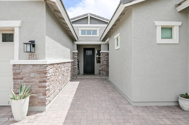2513 E Pleasant Ln, Phoenix, AZ 85042 - property entrance featuring stucco siding and stone siding