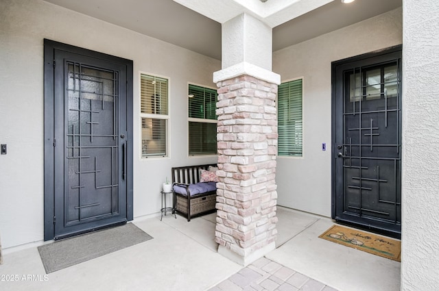 2513 E Pleasant Ln, Phoenix, AZ 85042 - entrance to property featuring a porch and stucco siding