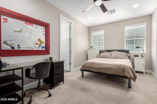 carpeted bedroom featuring ceiling fan