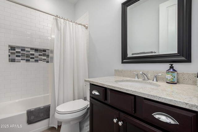 full bathroom featuring toilet, vanity, and shower / bath combo