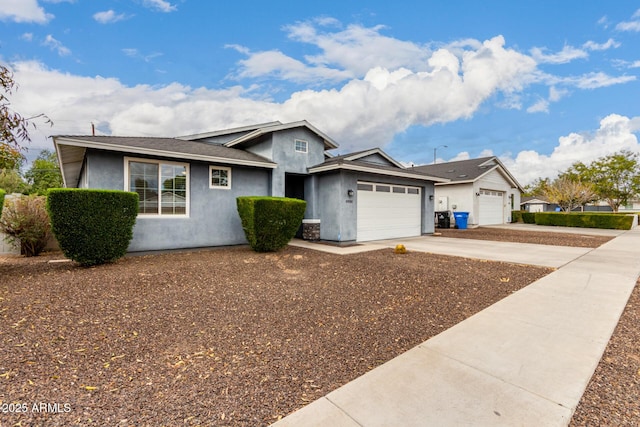 ranch-style house featuring a garage