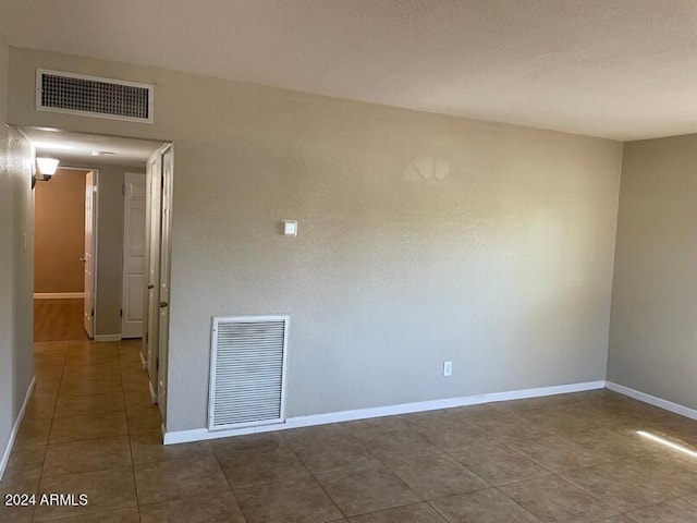 view of tiled spare room