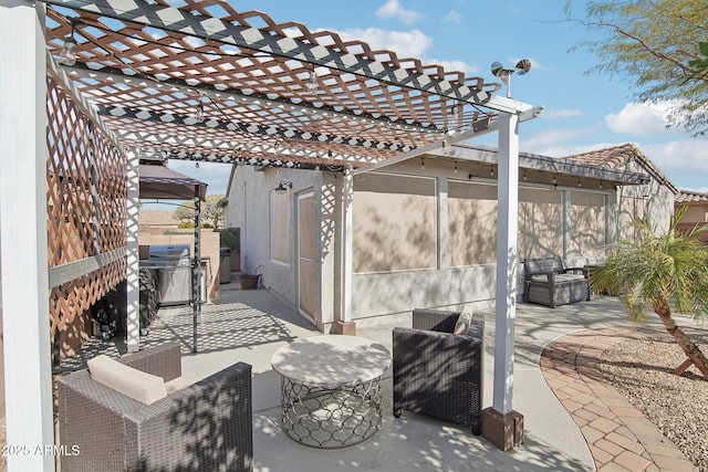 view of patio featuring a pergola